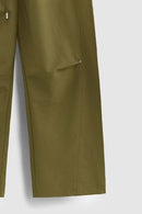 Double-Pleated Rivet-Detail Wide-Leg Cargo Pants in Green - front modeled view