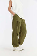 Double-Pleated Rivet-Detail Wide-Leg Cargo Pants in Green - front modeled view
