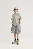 Loose-Fit Multi-Pocket Cargo Shorts in Light Gray - full-length modeled view