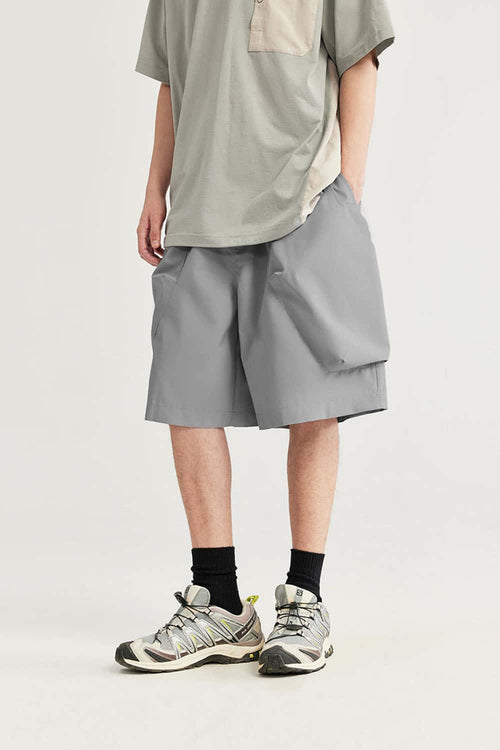 Loose-Fit Multi-Pocket Cargo Shorts in Light Gray - front modeled view