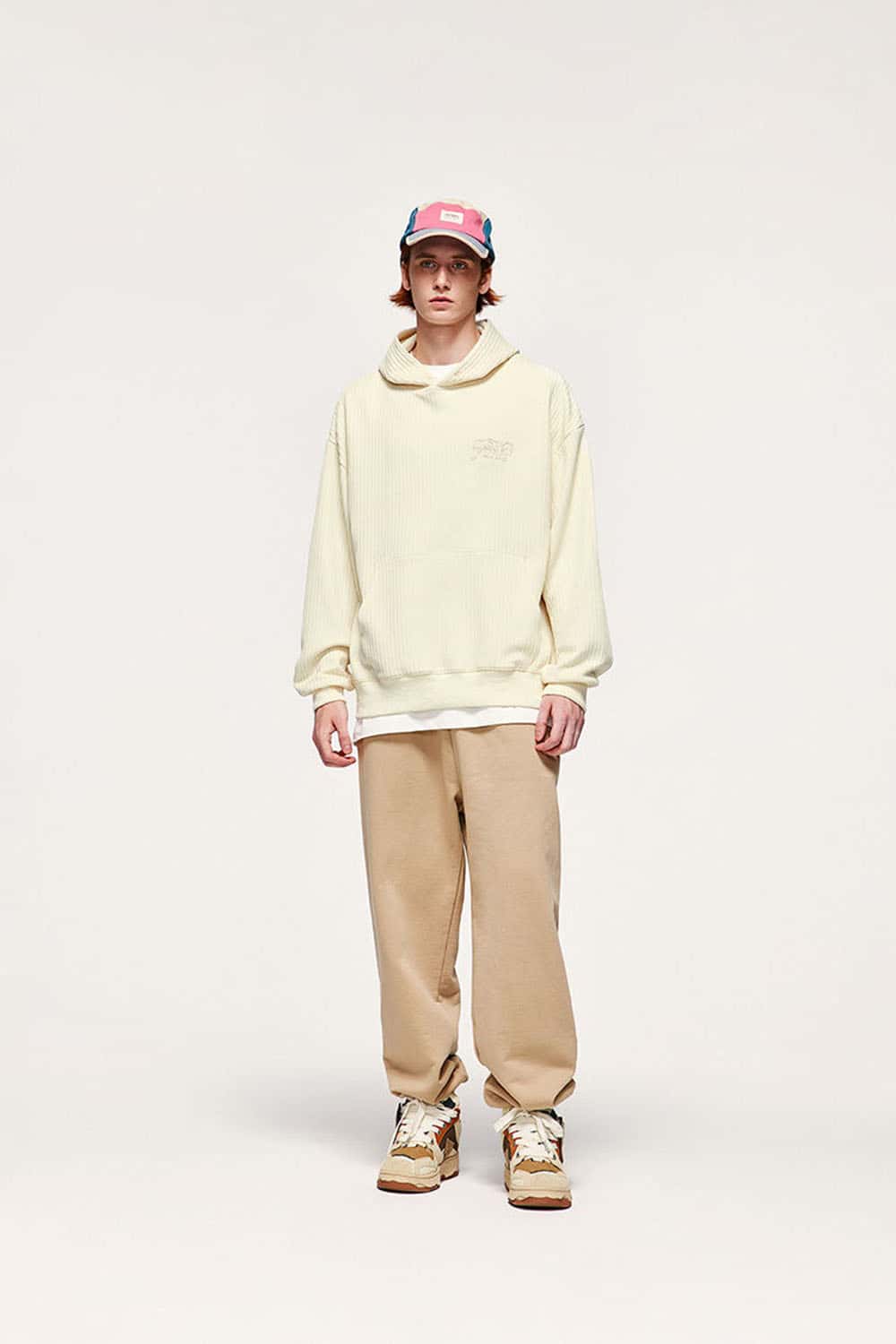 Embroidered Vertical-Rib Relaxed Pullover Hoodie in Apricot - full-length front modeled view