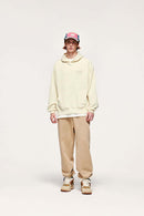 Embroidered Vertical-Rib Relaxed Pullover Hoodie in Apricot - full-length front modeled view
