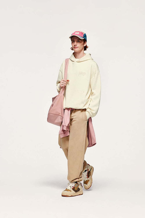 Embroidered Vertical-Rib Relaxed Pullover Hoodie in Apricot - three-quarter front modeled view