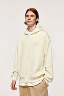 Embroidered Vertical-Rib Relaxed Pullover Hoodie in Apricot - front modeled view