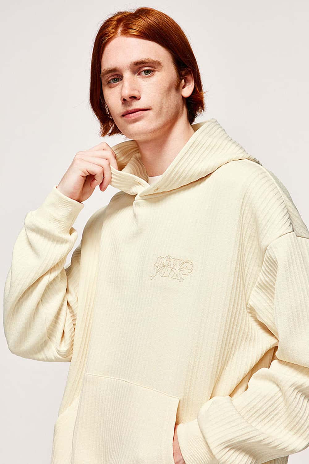 Embroidered Vertical-Rib Relaxed Pullover Hoodie in Apricot - modeled view