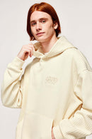 Embroidered Vertical-Rib Relaxed Pullover Hoodie in Apricot - modeled view