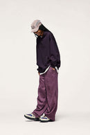 Embroidered Vertical-Rib Relaxed Pullover Hoodie in Purple - three-quarter front modeled view
