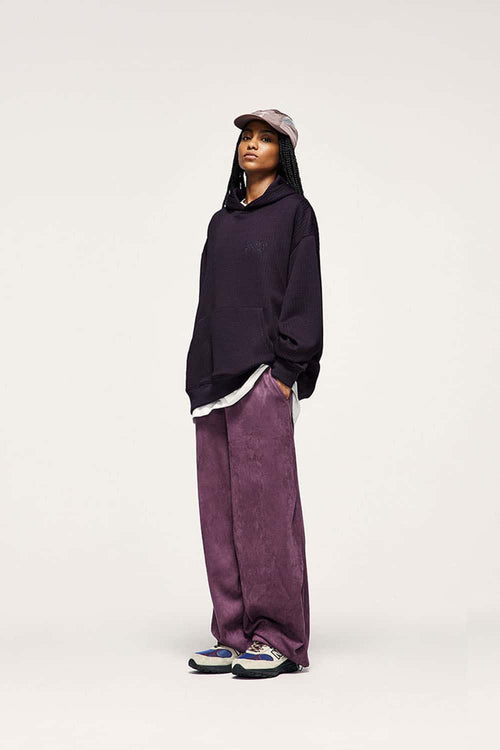 Embroidered Vertical-Rib Relaxed Pullover Hoodie in Purple - three-quarter front modeled view