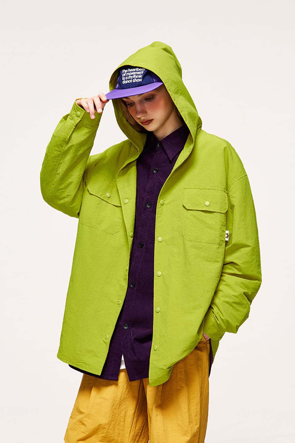 Water-Repellent Hooded Snap-Front Nylon Shirt Jacket in Green - three-quarter front modeled view