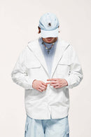 Water-Repellent Hooded Snap-Front Nylon Shirt Jacket in Teeth White - product detail close-up