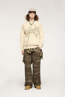 Washed Cotton Wide-Leg Carpenter Pants in Khaki Green - full-length front modeled view