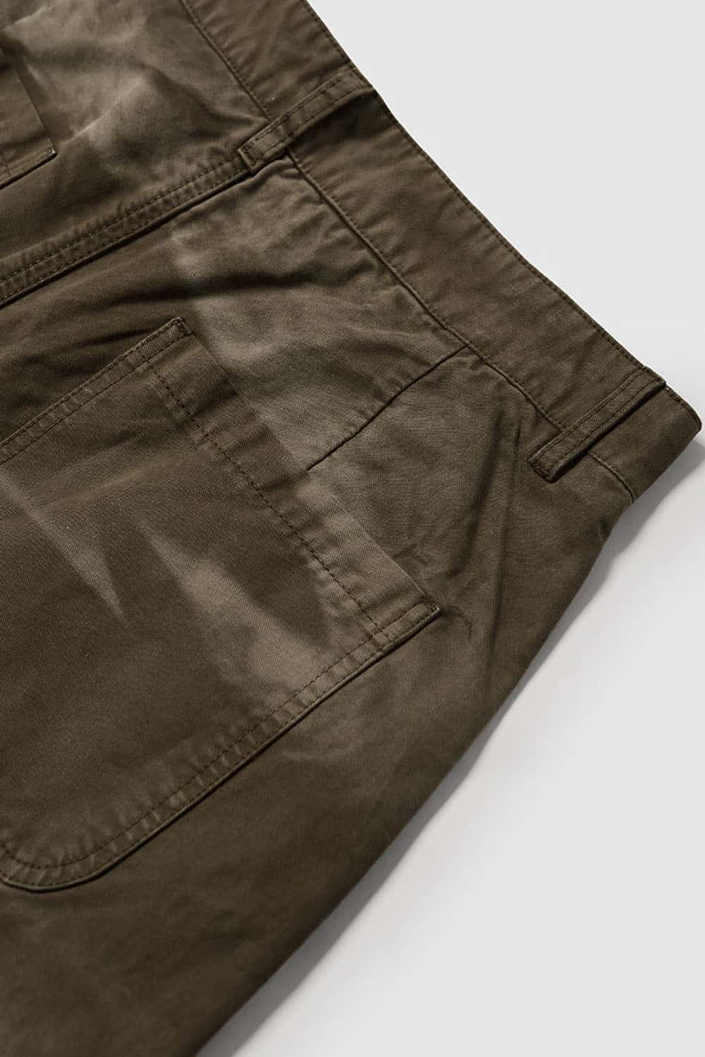 Washed Cotton Wide-Leg Carpenter Pants in Khaki Green - back pocket detail