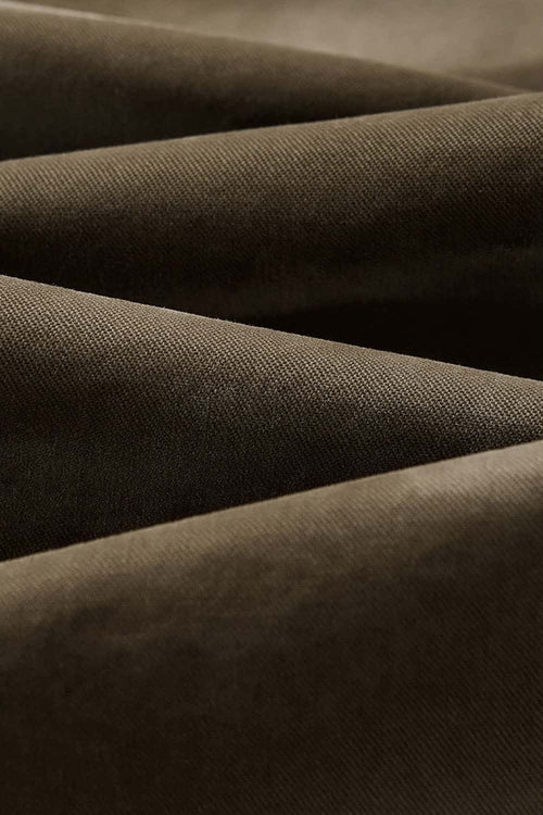 Washed Cotton Wide-Leg Carpenter Pants in Khaki Green - fabric texture close-up