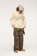 Washed Cotton Wide-Leg Carpenter Pants in Khaki Green - full-length front modeled view