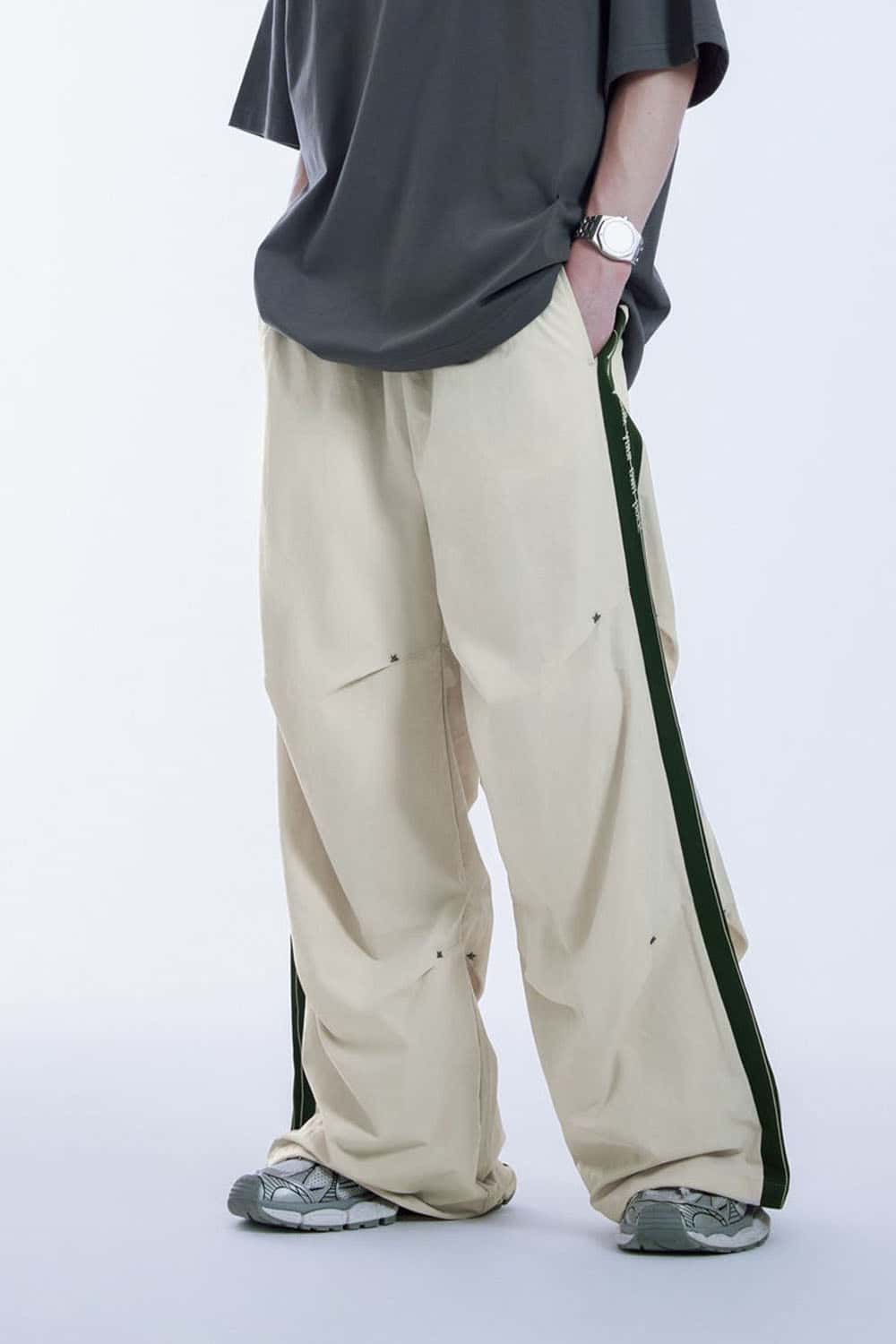 Striped Drawstring Loose Parachute Pants in Apricot - product detail close-up