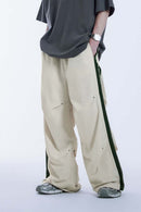 Striped Drawstring Loose Parachute Pants in Apricot - product detail close-up