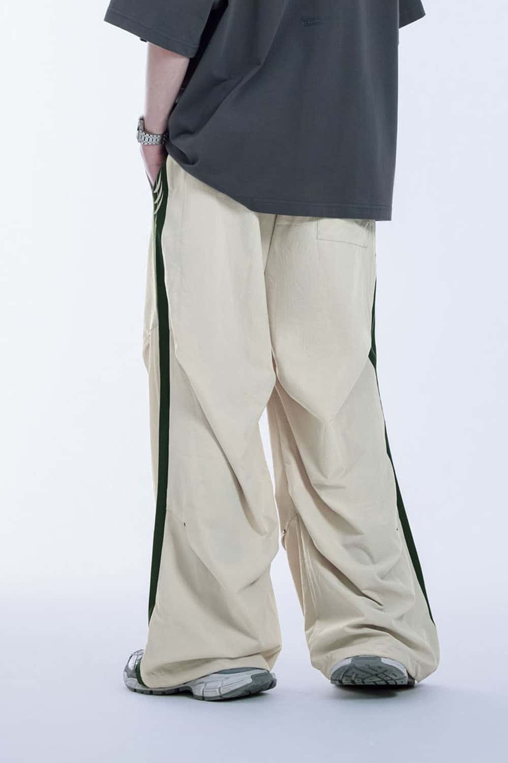 Striped Drawstring Loose Parachute Pants in Apricot - product detail close-up