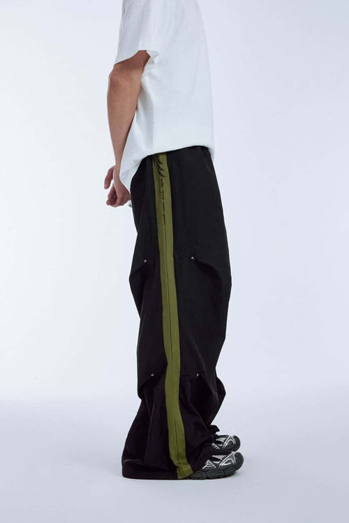 Striped Drawstring Loose Parachute Pants in Black - product detail close-up