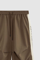 Striped Drawstring Loose Parachute Pants in Brown - waistband detail