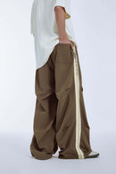 Striped Drawstring Loose Parachute Pants in Brown - three-quarter front modeled view