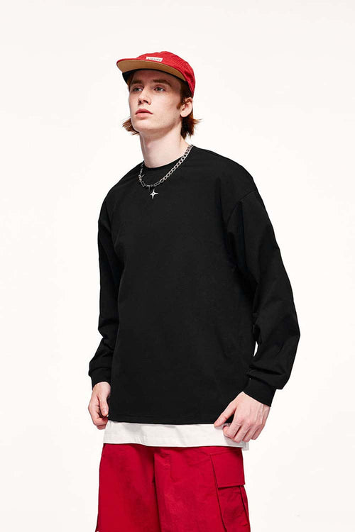 Quick-Drying Relaxed Drop-Shoulder Long-Sleeve T-Shirt in Black - three-quarter front modeled view