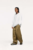 Quick-Drying Relaxed Drop-Shoulder Long-Sleeve T-Shirt in White - full-length front modeled view