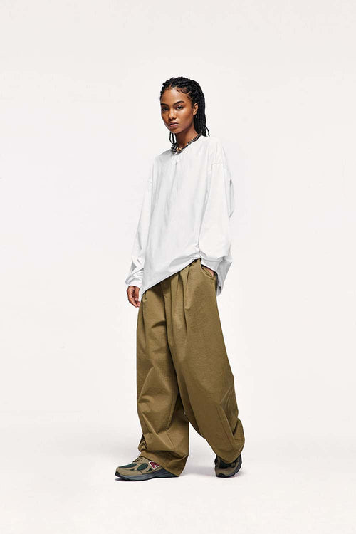 Quick-Drying Relaxed Drop-Shoulder Long-Sleeve T-Shirt in White - full-length front modeled view