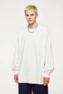 Oversized Longline Heavyweight Cotton T-Shirt in Teeth White - front modeled view