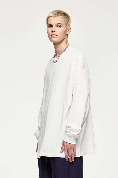 Oversized Longline Heavyweight Cotton T-Shirt in Teeth White - front modeled view