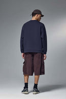 Drop-Shoulder Kangaroo-Pocket Fleece Sweatshirt in Eclipse Blue - full-length back modeled view