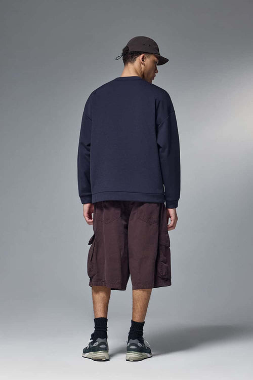 Drop-Shoulder Kangaroo-Pocket Fleece Sweatshirt in Eclipse Blue - full-length back modeled view