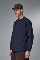 Drop-Shoulder Kangaroo-Pocket Fleece Sweatshirt in Eclipse Blue - front modeled view