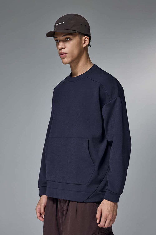 Drop-Shoulder Kangaroo-Pocket Fleece Sweatshirt in Eclipse Blue - front modeled view