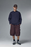 Drop-Shoulder Kangaroo-Pocket Fleece Sweatshirt in Eclipse Blue - full-length front modeled view