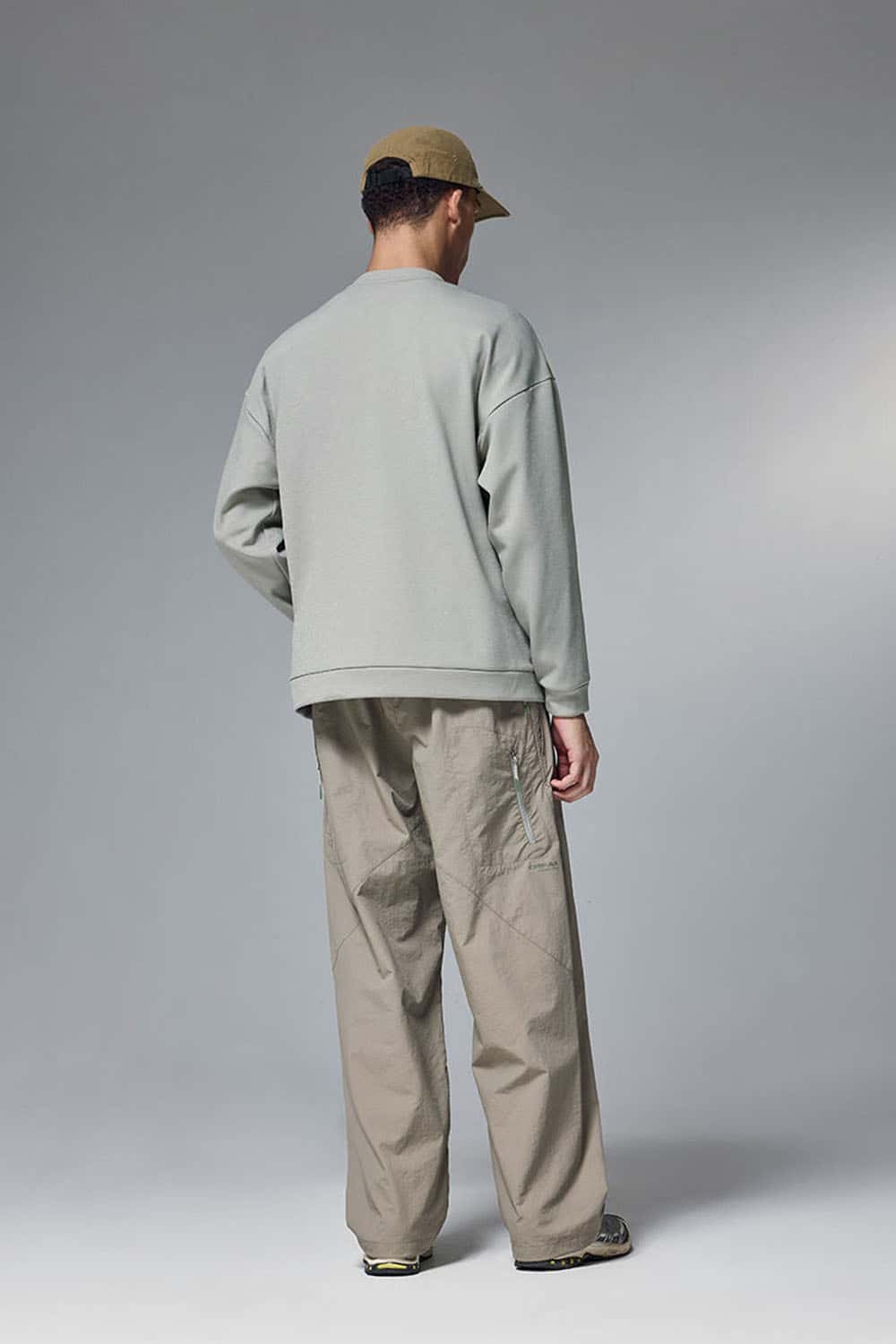 Drop-Shoulder Kangaroo-Pocket Fleece Sweatshirt in Stone Gray - full-length back modeled view