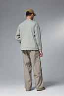 Drop-Shoulder Kangaroo-Pocket Fleece Sweatshirt in Stone Gray - full-length back modeled view