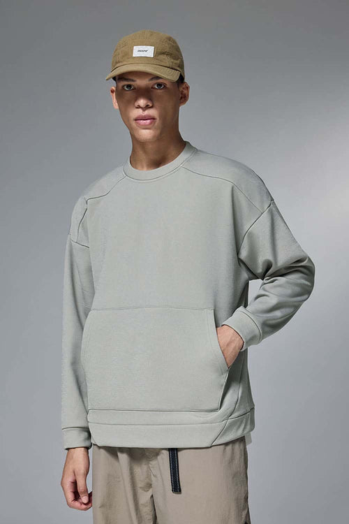 Drop-Shoulder Kangaroo-Pocket Fleece Sweatshirt in Stone Gray - front modeled view