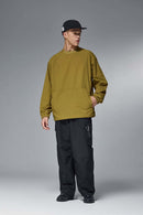 Utility Pocket Nylon Long-Sleeve Pullover in Green - full-length front modeled view