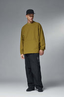 Utility Pocket Nylon Long-Sleeve Pullover in Green - full-length front modeled view