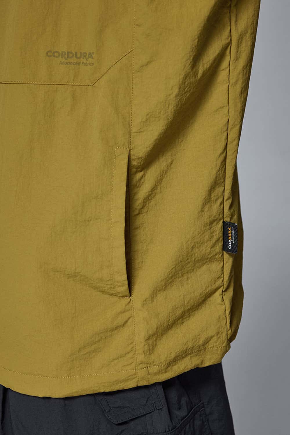 Utility Pocket Nylon Long-Sleeve Pullover in Green - pocket detail