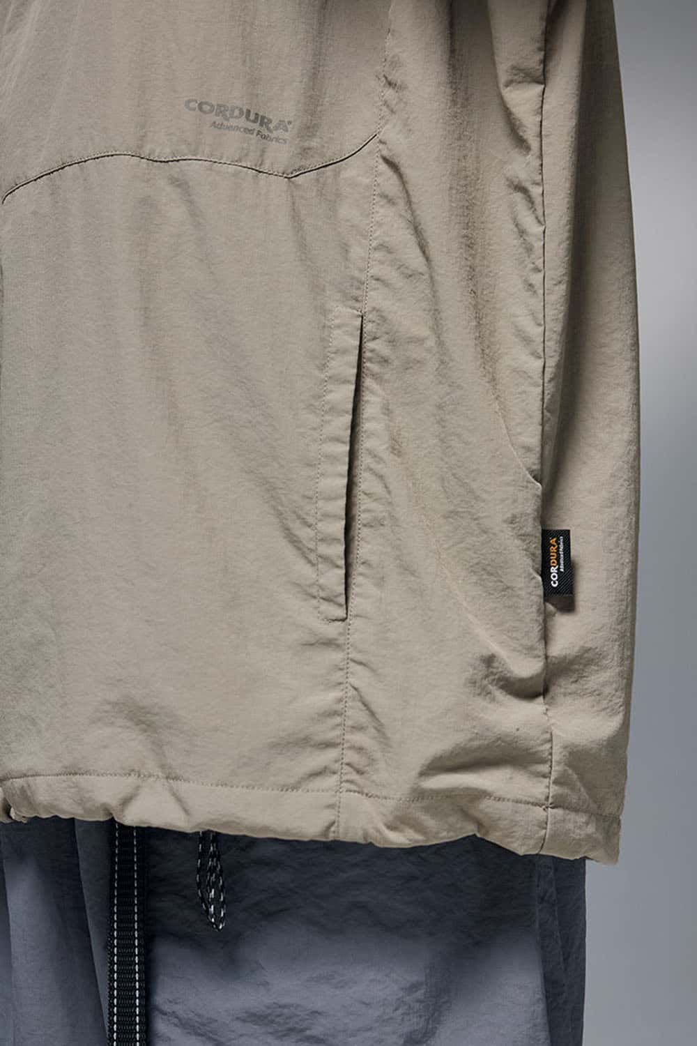 Utility Pocket Nylon Long-Sleeve Pullover in Trunk Brown - pocket detail