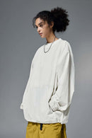 Utility Pocket Nylon Long-Sleeve Pullover in White - three-quarter front modeled view