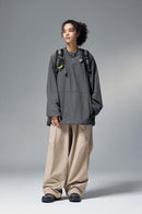Utility Pocket Nylon Long-Sleeve Pullover in Wilderness Gray - full-length front modeled view