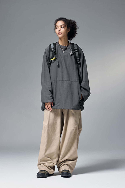 Utility Pocket Nylon Long-Sleeve Pullover in Wilderness Gray - full-length front modeled view