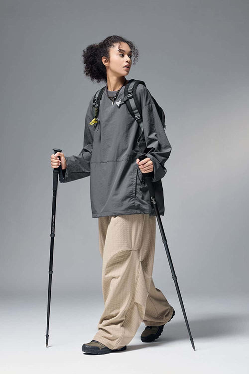 Utility Pocket Nylon Long-Sleeve Pullover in Wilderness Gray - full-length front modeled view