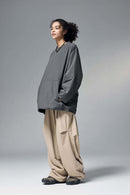Utility Pocket Nylon Long-Sleeve Pullover in Wilderness Gray - full-length front modeled view