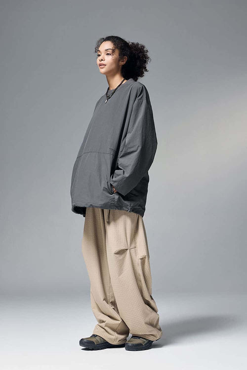 Utility Pocket Nylon Long-Sleeve Pullover in Wilderness Gray - full-length front modeled view