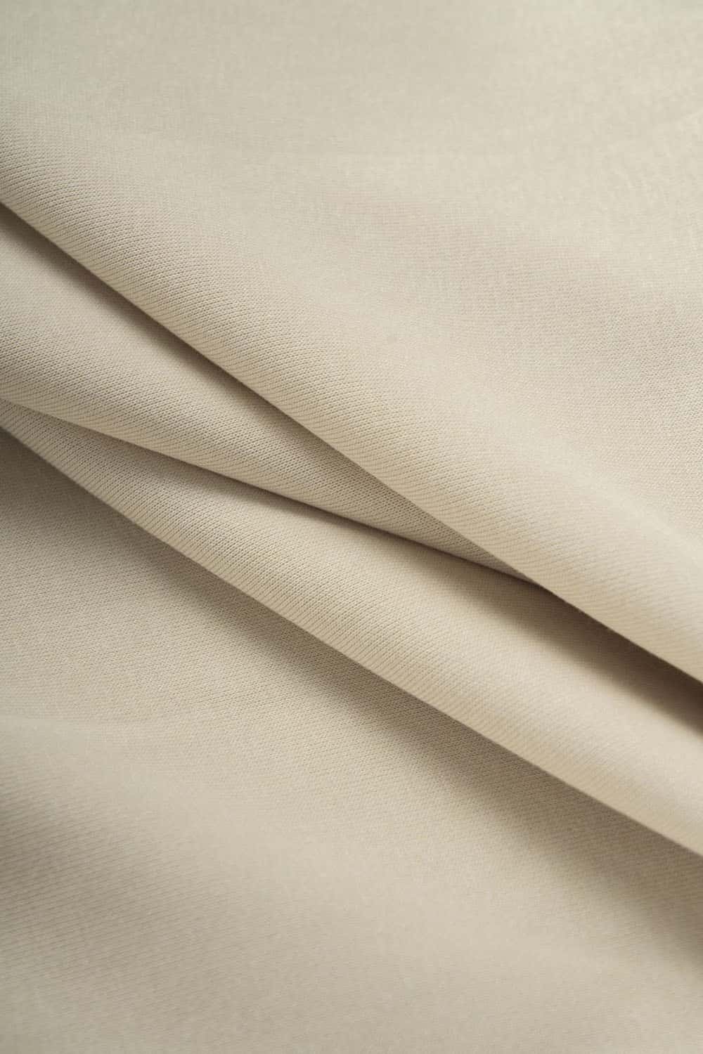 Drop-Shoulder Rib-Trim Pullover Hoodie in Apricot - fabric texture close-up