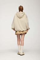 Drop-Shoulder Rib-Trim Pullover Hoodie in Apricot - back modeled view