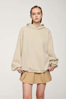 Drop-Shoulder Rib-Trim Pullover Hoodie in Apricot - front modeled view